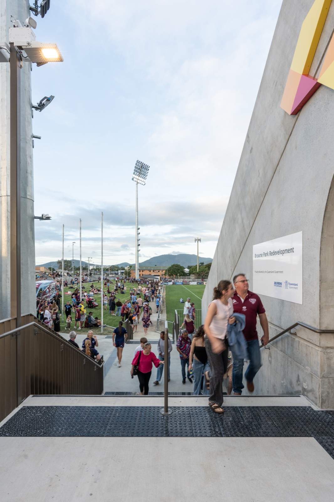 Fans leaving the stadium down the Browne Park redevelopment walkway after a match